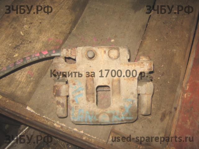 Mitsubishi Lancer 9 [CS/Classic] Суппорт задний левый (в сборе со скобой)