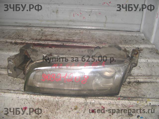Mazda 626 [GE] Фара левая
