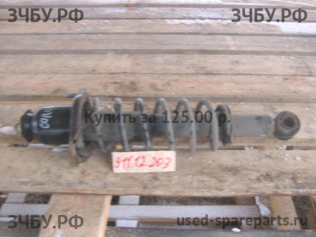 Toyota Corolla (E12) Стойка задняя левая (в сборе)