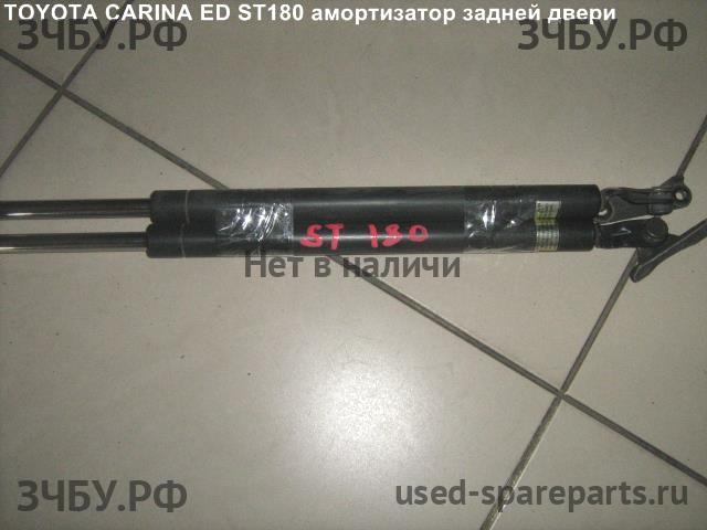 Toyota Carina.E (T190) Амортизатор крышки багажника