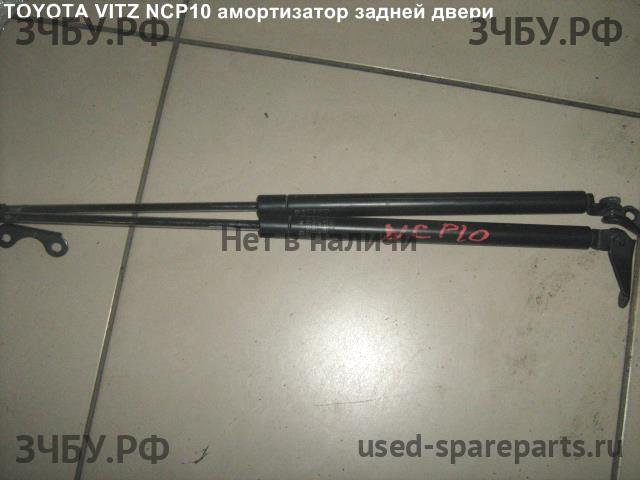 Toyota Vitz 1 Амортизатор крышки багажника