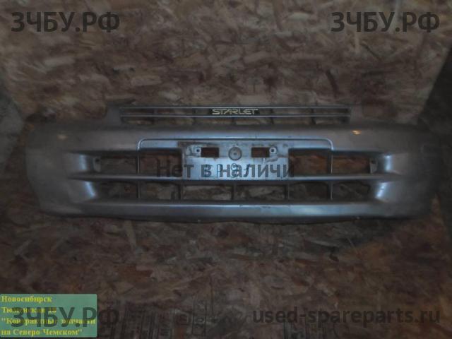 Toyota Starlet (P90) Бампер передний