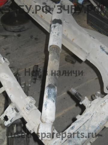Nissan Navara 1 (D40) Амортизатор задний