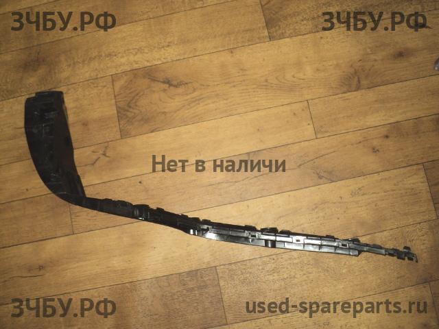 Volkswagen Passat B7 Кронштейн бампера задний