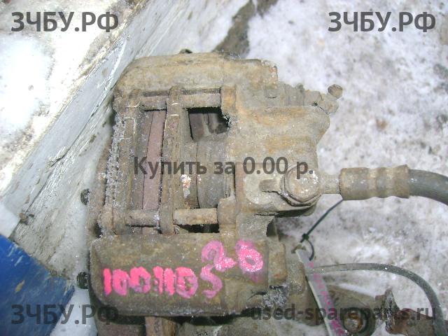 Toyota Celica (T23) Суппорт задний правый (в сборе со скобой)