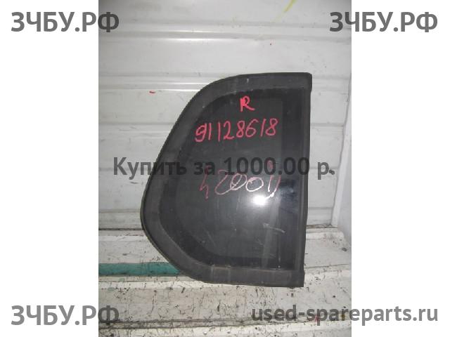 Mitsubishi L200 (4)[KB] Стекло кузовное глухое левое