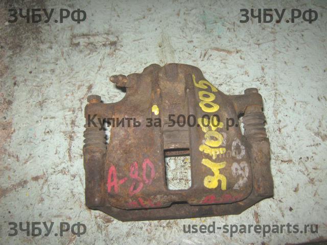 Audi 80/90 [B4] Суппорт передний левый (в сборе со скобой)