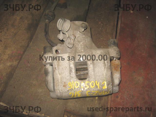 Mazda 3 [BK] Суппорт задний левый (в сборе со скобой)