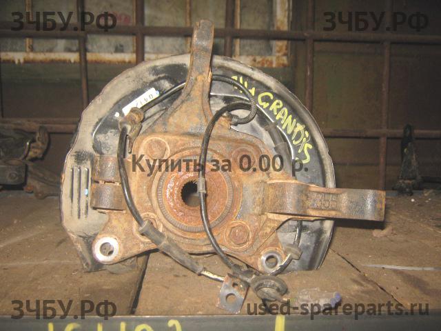 Mitsubishi Grandis (NA4W) Кулак поворотный передний левый (со ступицей)