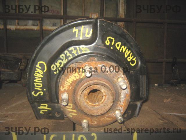 Mitsubishi Grandis (NA4W) Кулак поворотный передний левый (со ступицей)