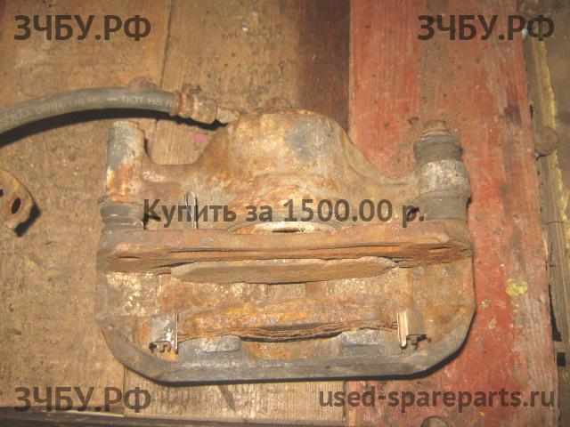 Hyundai Getz Суппорт передний левый (в сборе со скобой)