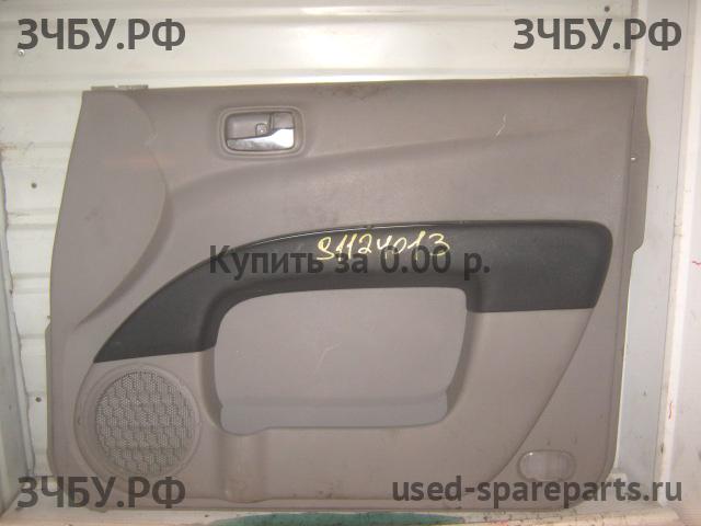 Mitsubishi L200 (4)[KB] Обшивка двери передней правой