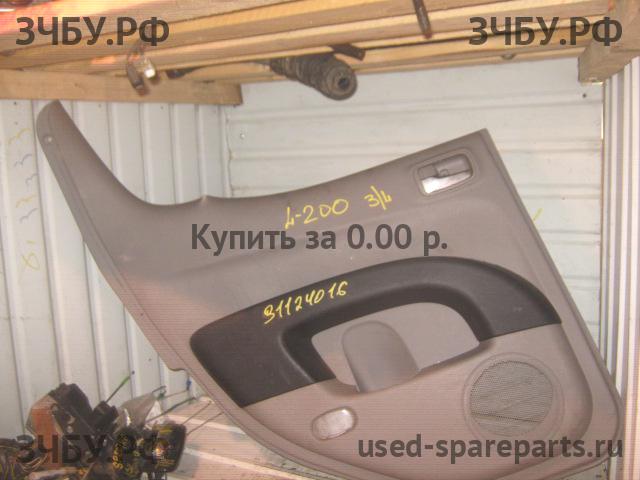 Mitsubishi L200 (4)[KB] Обшивка двери задней левой