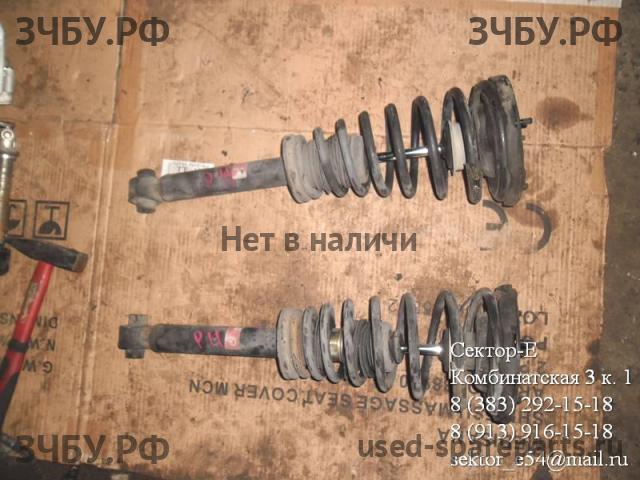 Nissan Primera P11 Стойка передняя левая (в сборе)