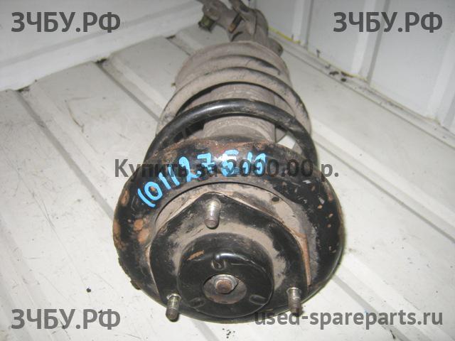 Nissan Primera P12 Стойка передняя левая (в сборе)