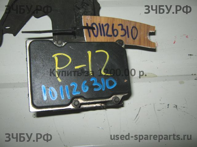 Nissan Primera P12 Блок ABS (насос)