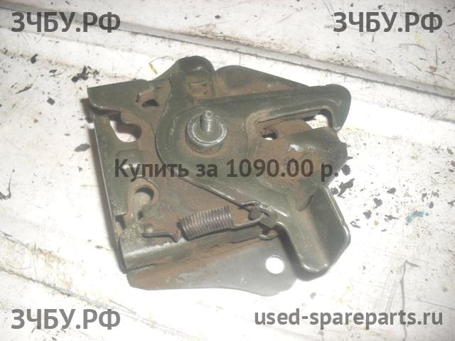 KIA Spectra Замок капота