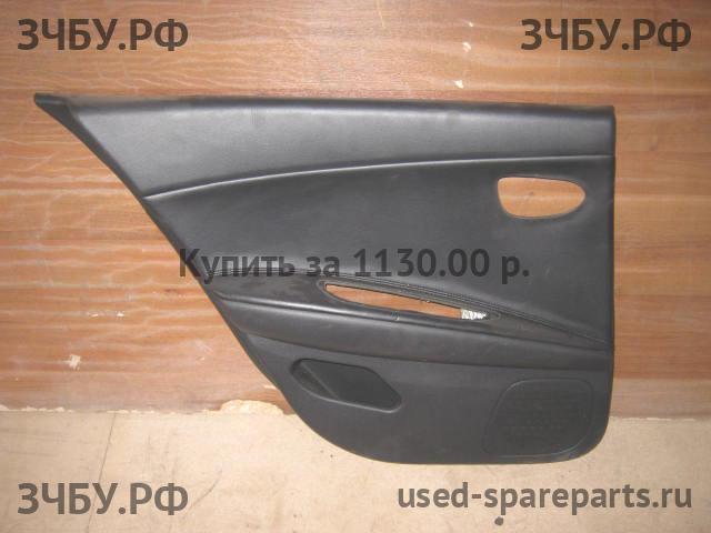 Nissan Primera P12 Обшивка двери задней левой