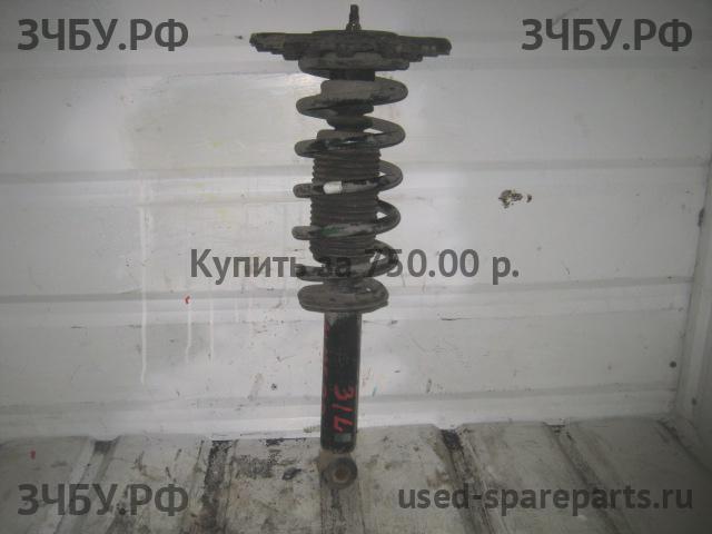 Nissan Almera Classic Стойка задняя левая (в сборе)