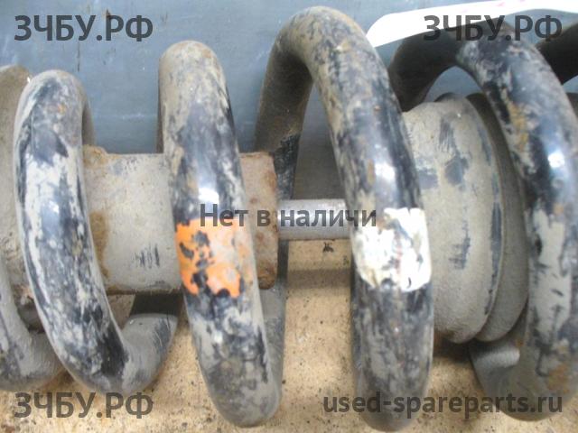 Mitsubishi L200 (4)[KB] Стойка передняя