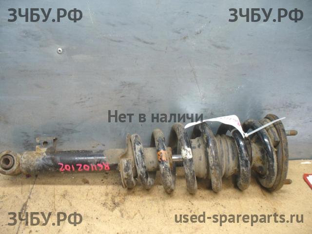 Mitsubishi L200 (4)[KB] Стойка передняя