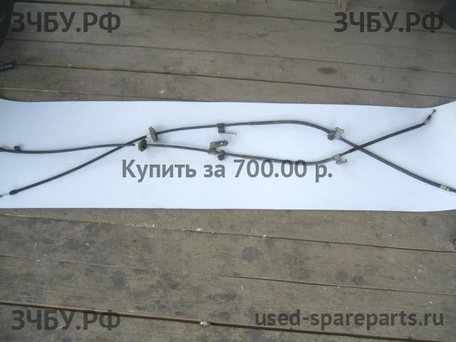 Opel Astra J Трос стояночного тормоза