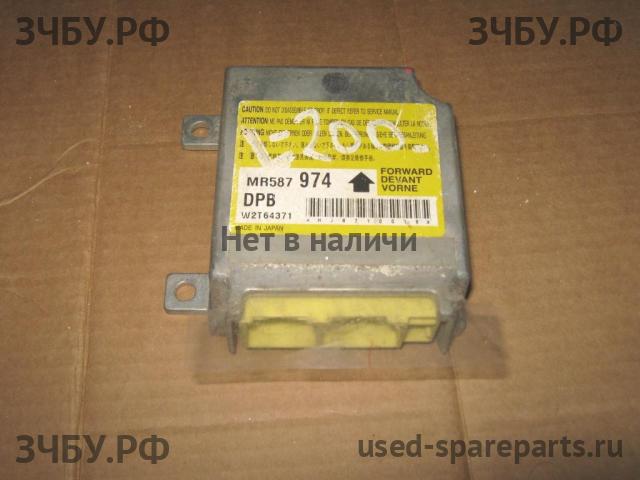 Mitsubishi L200 (4)[KB] Блок управления AirBag (блок активации SRS)