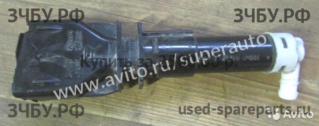 Mitsubishi L200 (4)[KB] Форсунка омывателя фары правая