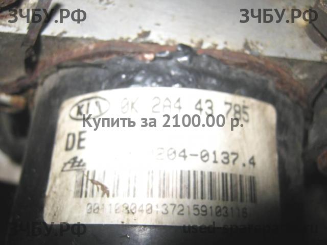 KIA Clarus Блок ABS (насос)