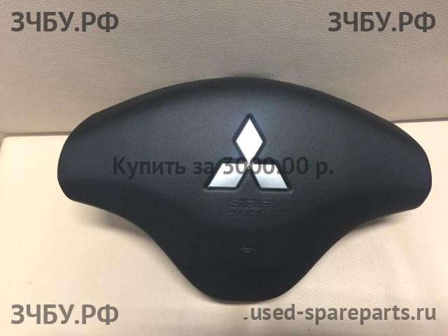 Mitsubishi L200 (4)[KB] Накладка звукового сигнала (в руле)