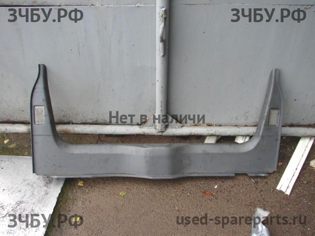 Volvo S60 (1) Обшивка багажника