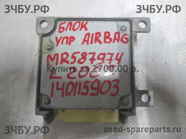 Mitsubishi L200 (4)[KB] Блок управления AirBag (блок активации SRS)