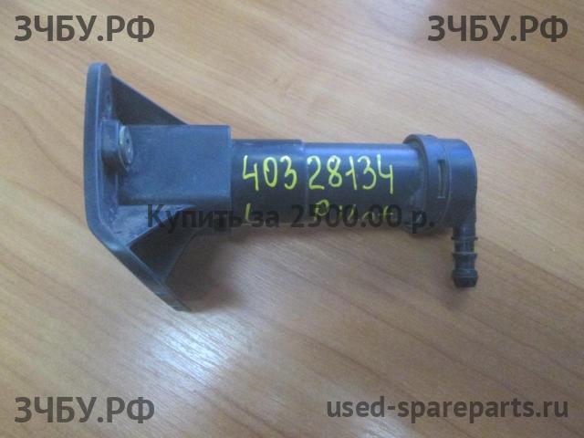 Honda Pilot (2) Форсунка омывателя фары левая