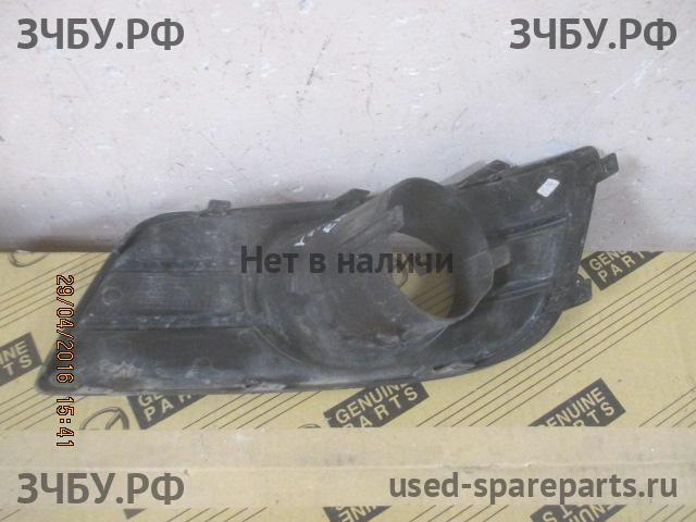 Suzuki SX4 (1) Рамка противотуманной фары правой