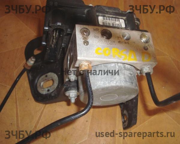 Opel Corsa D Блок ABS (насос)