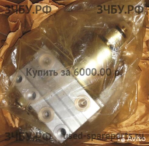 Mazda 323 [BJ] Блок ABS (насос)
