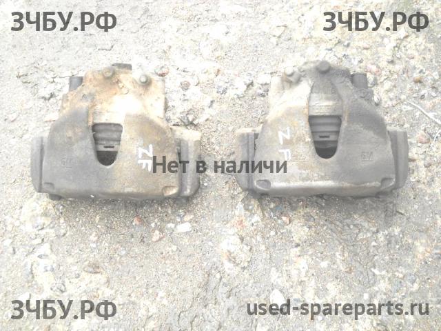 Opel Zafira B Суппорт передний правый (в сборе со скобой)