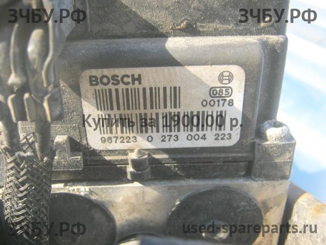 Saab 9-3 (1) Блок ABS (насос)