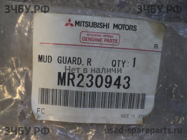 Mitsubishi Pajero/Montero Sport 1 (K9) Брызговик задний левый