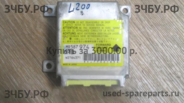 Mitsubishi L200 (4)[KB] Блок управления AirBag (блок активации SRS)
