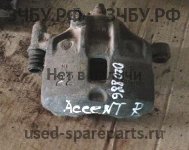 Hyundai Accent 2 Суппорт передний правый (в сборе со скобой)