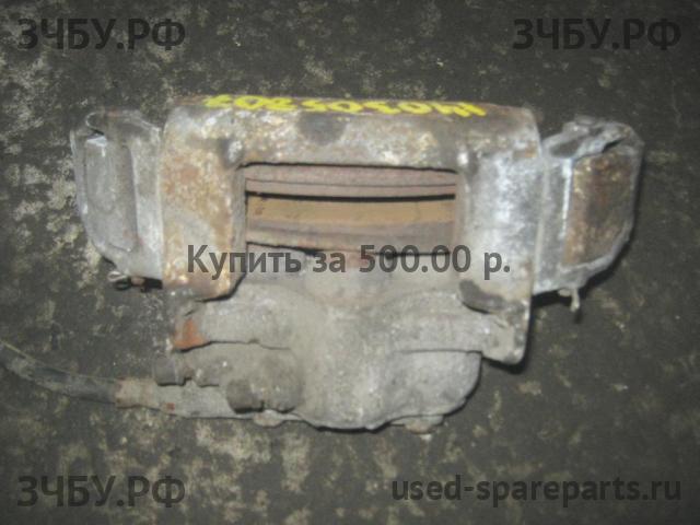 Chevrolet Niva Суппорт передний левый (в сборе со скобой)