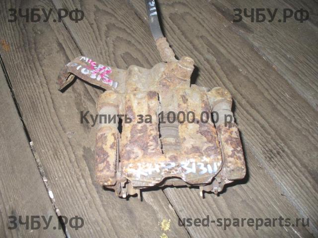 Nissan Micra K11 Суппорт задний левый (в сборе со скобой)
