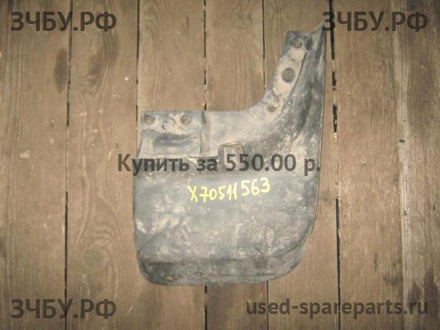 Mitsubishi L200 (4)[KB] Брызговик задний правый