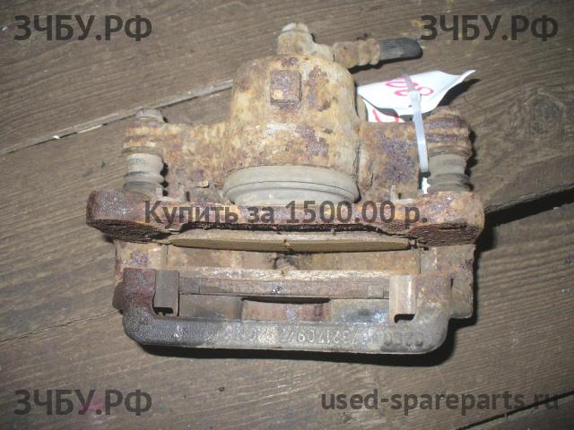 Nissan Micra K11 Суппорт передний правый (в сборе со скобой)