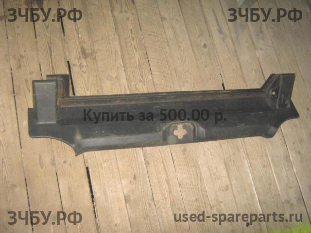 Saab 9-3 (1) Обшивка багажника задней панели