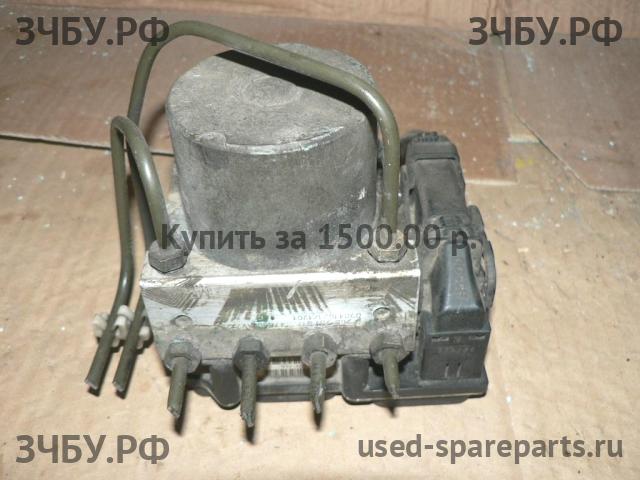 Nissan Primera P12 Блок ABS (насос)