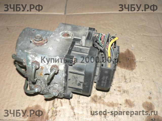 Nissan Almera 16 Блок ABS (насос)