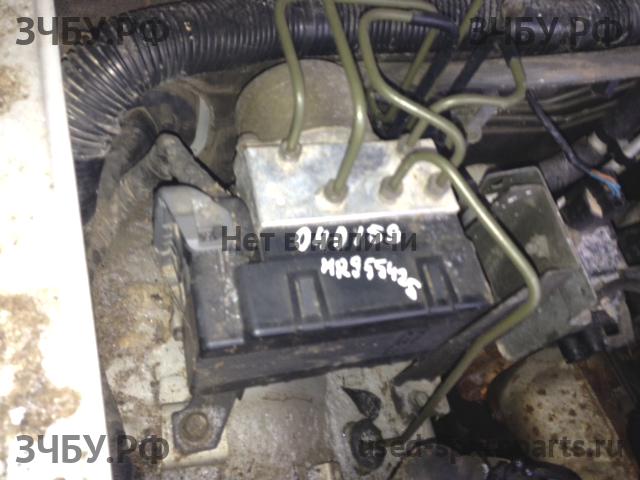 Mitsubishi Pajero/Montero Sport 1 (K9) Блок ABS (насос)