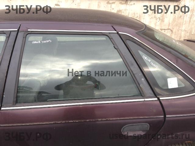 Ford Taurus 1 Стекло двери задней левой